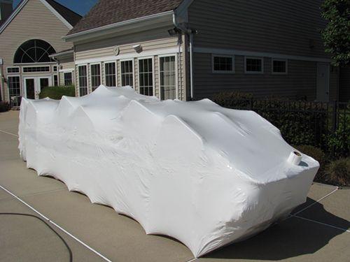 Chairs wrapped in shrinkwrap 2